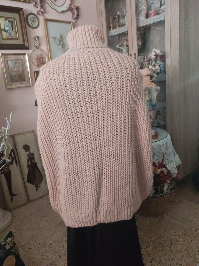 Chaleco punto cuello alto rosa claro