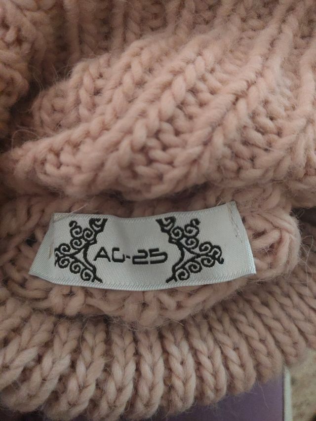 Chaleco punto cuello alto rosa claro