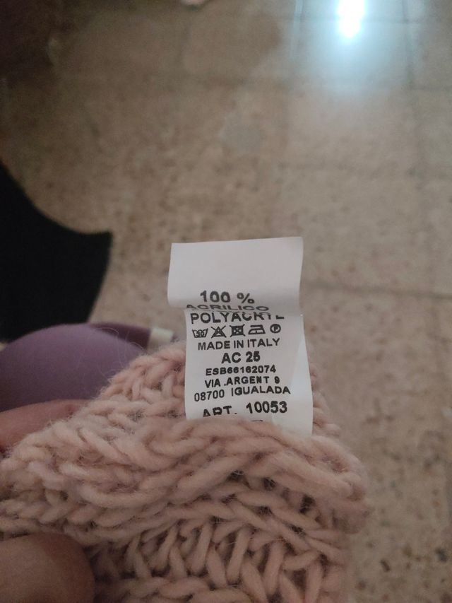 Chaleco punto cuello alto rosa claro