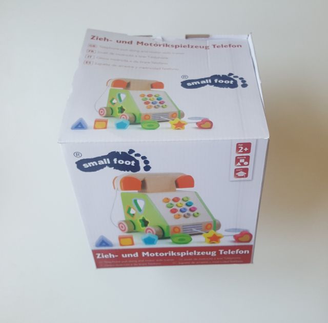 Juguete teléfono de madera correpasillos