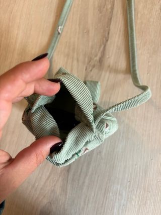 Borsetta bambina verde menta con fiocco a tracolla