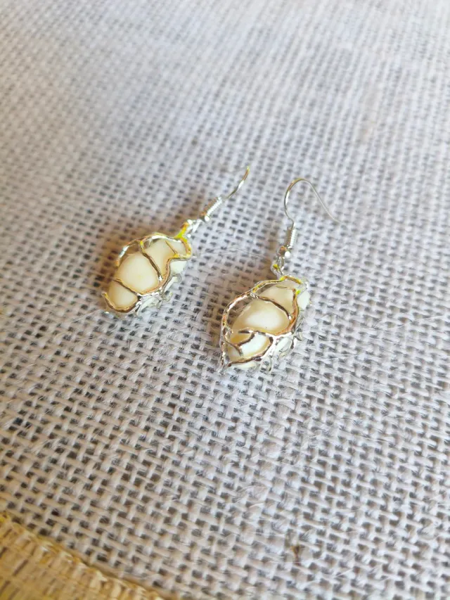 Pendientes de perlas de venado