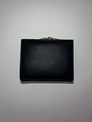 Portafoglio Saint Laurent nero con logo oro