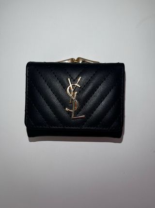 Portafoglio Saint Laurent nero con logo oro