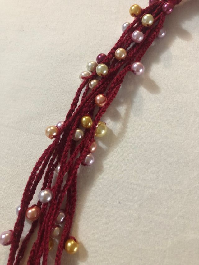 Collana cotone con perline