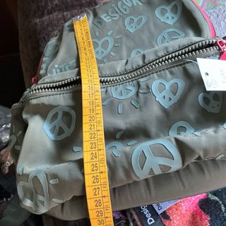 Mochila Desigual verde con detalles