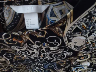 Vestido estampado negro y dorado