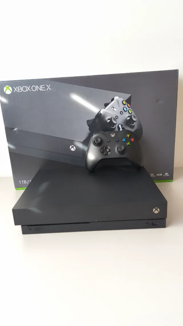 Xbox One X 1TB y 2 juegos