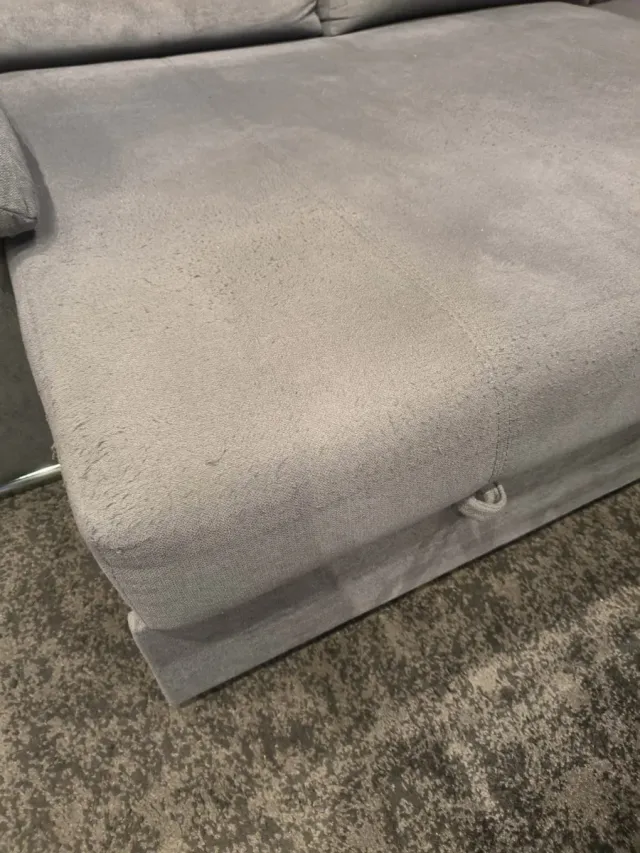 Sofá cama gris tela