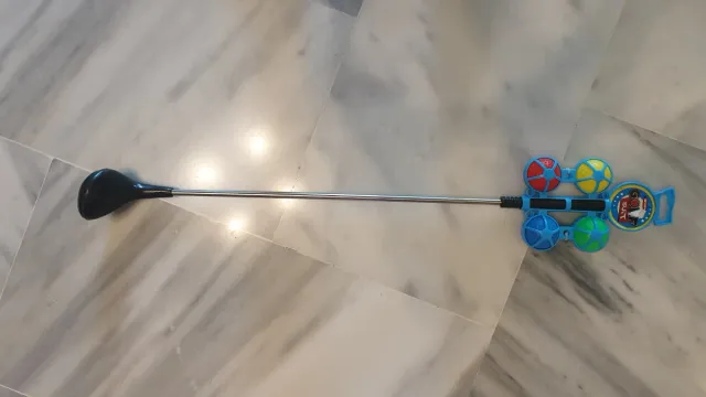 Clube de golfe infantil com bolas