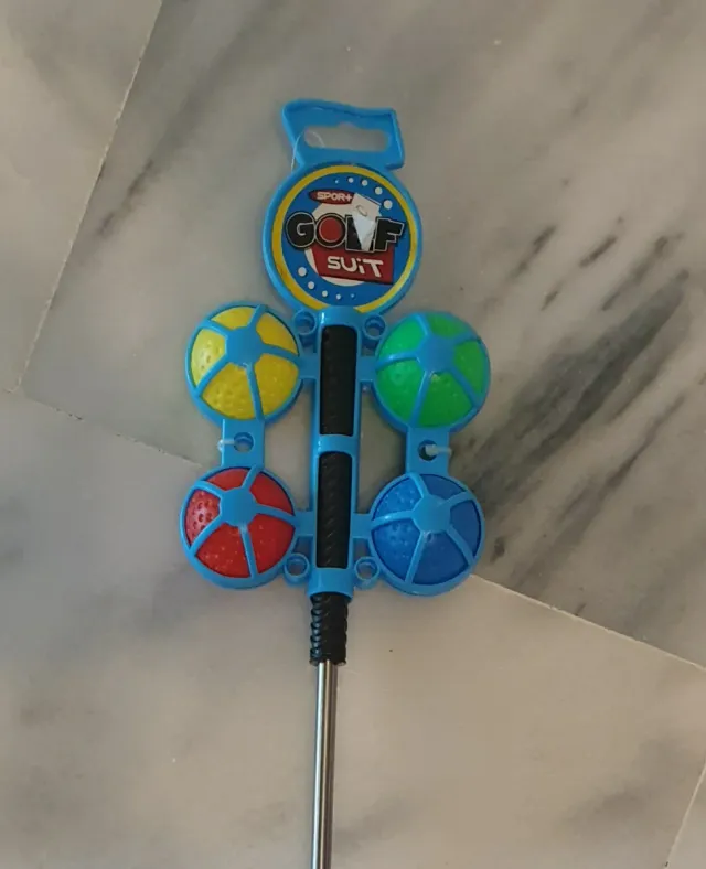 Clube de golfe infantil com bolas