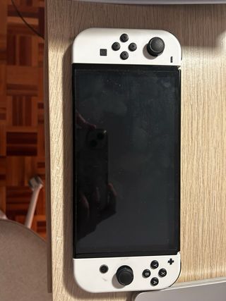 Nintendo Switch OLED + Juego It Takes Two