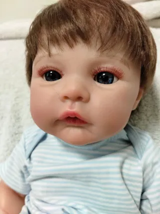 Bambola reborn con ciuccio