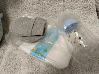 Bambola reborn con ciuccio