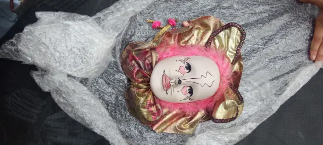 Máscara de payaso de porcelana