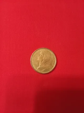 Moneta folcloristica metà lira metà franco