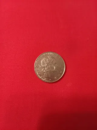 Moneta folcloristica metà lira metà franco