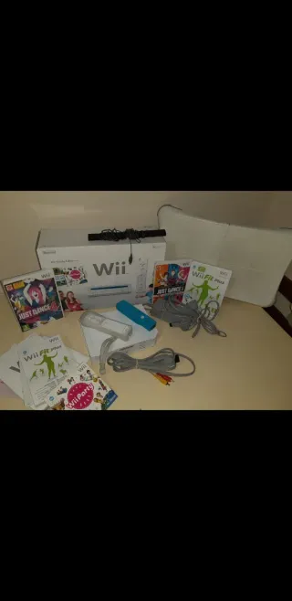 Consola Wii con tabla y juegos
