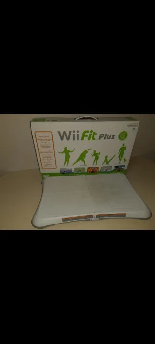 Consola Wii con tabla y juegos