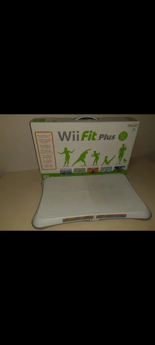 Consola Wii con tabla y juegos