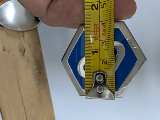 Logotipo Vespa Hexagonal Azul y Plateado