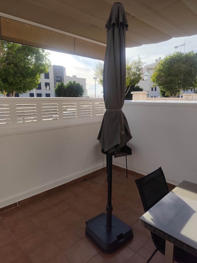 Sombrilla con soporte