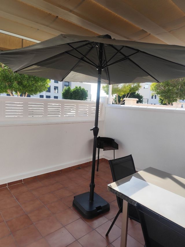 Sombrilla con soporte