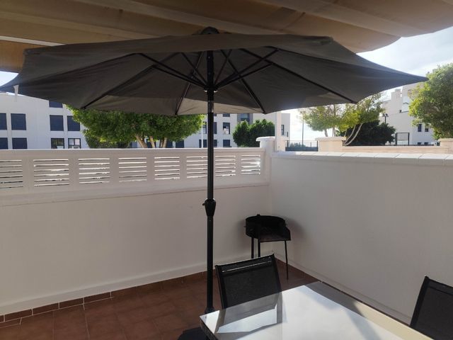 Sombrilla con soporte