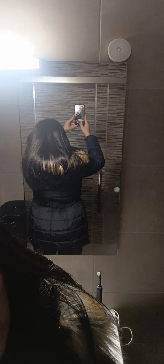 Piume nere da donna con cappuccio che si stacca