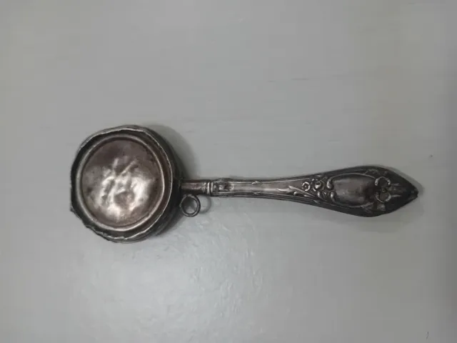 Sonajero antiguo de plata