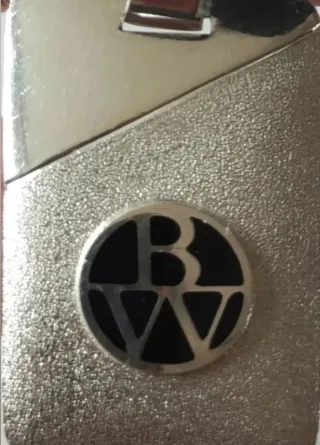 Gemelos, abrecartas y llaveros de plata