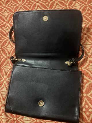 Tracolla nera con fiocchetti dorati