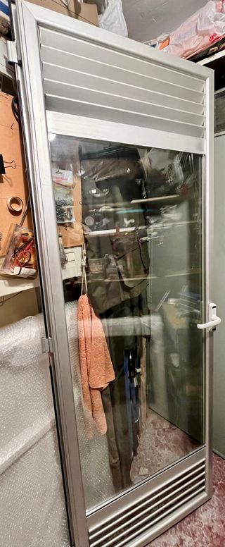 Puerta lavadero aluminio con lamas