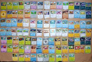 100 carte Pokémon + Latta Arcanine