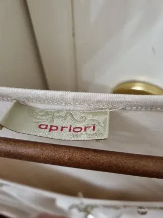 Camiseta gris manga larga con lentejuelas