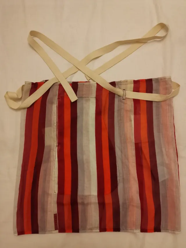 Pareo corto rayas. Prada