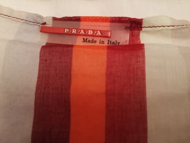 Pareo corto rayas. Prada