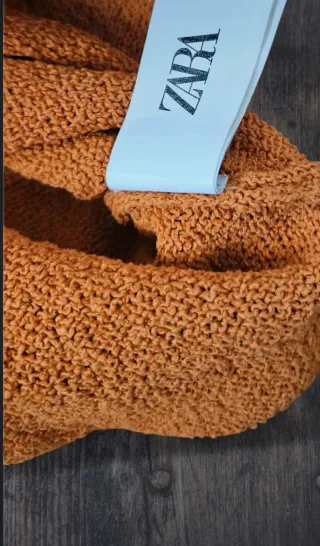 Maglione arancione manica corta