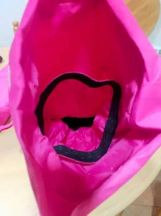 Pantalones y guantes de esquí rosas