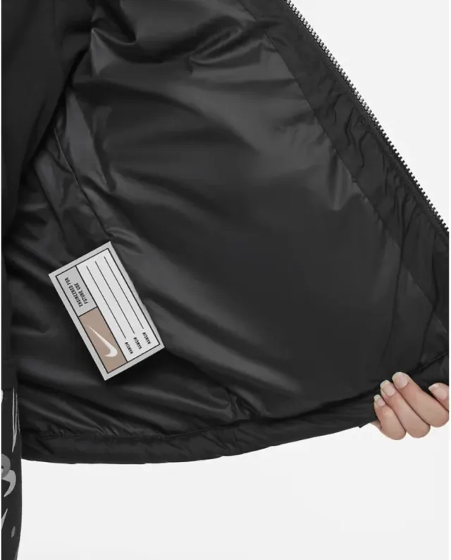 Piumino Nike bambino taglia L con difetto