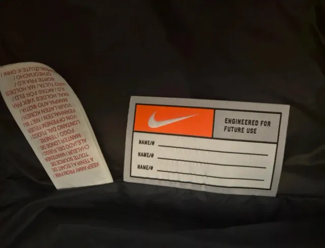 Piumino Nike bambino taglia L con difetto