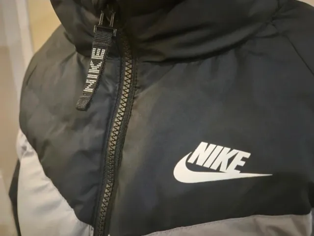 Piumino Nike bambino taglia L con difetto