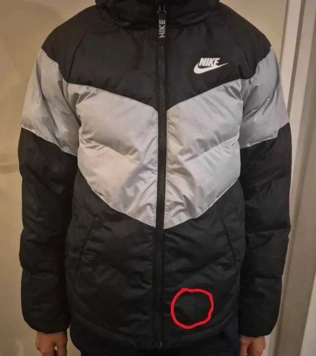 Piumino Nike bambino taglia L con difetto