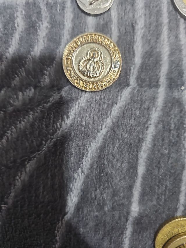 Moneda de 1 ,2 y0, 5 0cent