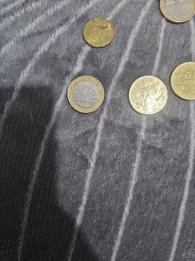 Moneda de 1 ,2 y0, 5 0cent