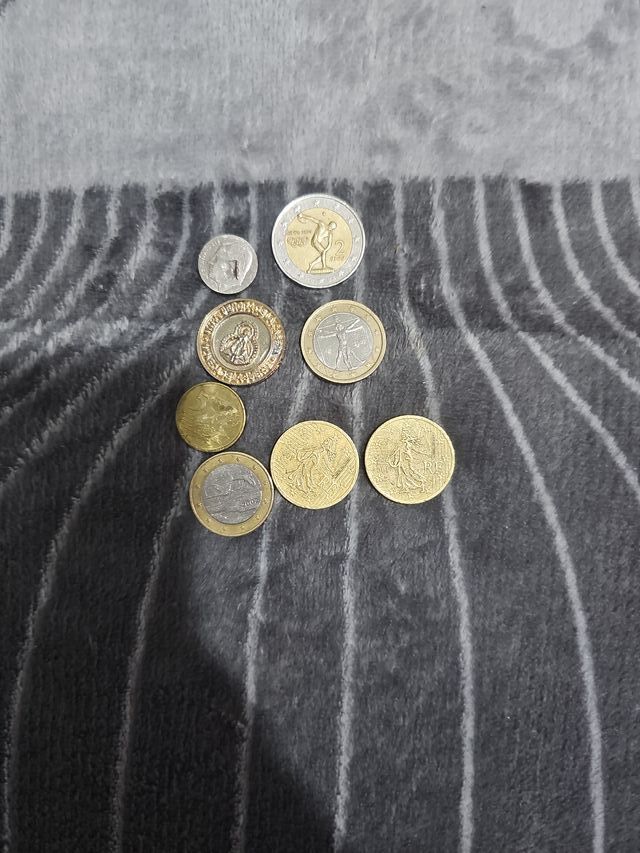 Moneda de 1 ,2 y0, 5 0cent
