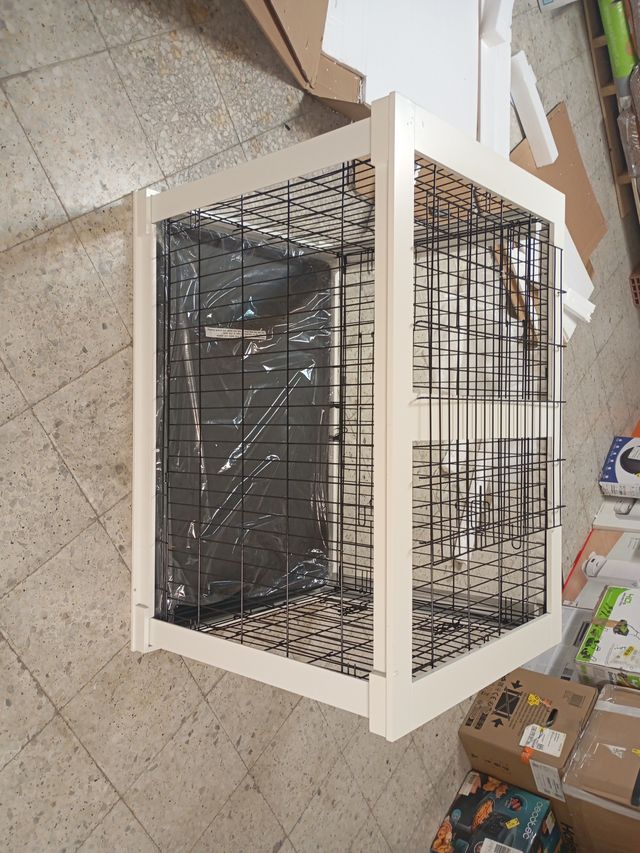 Jaula para mascotas negra y blanca