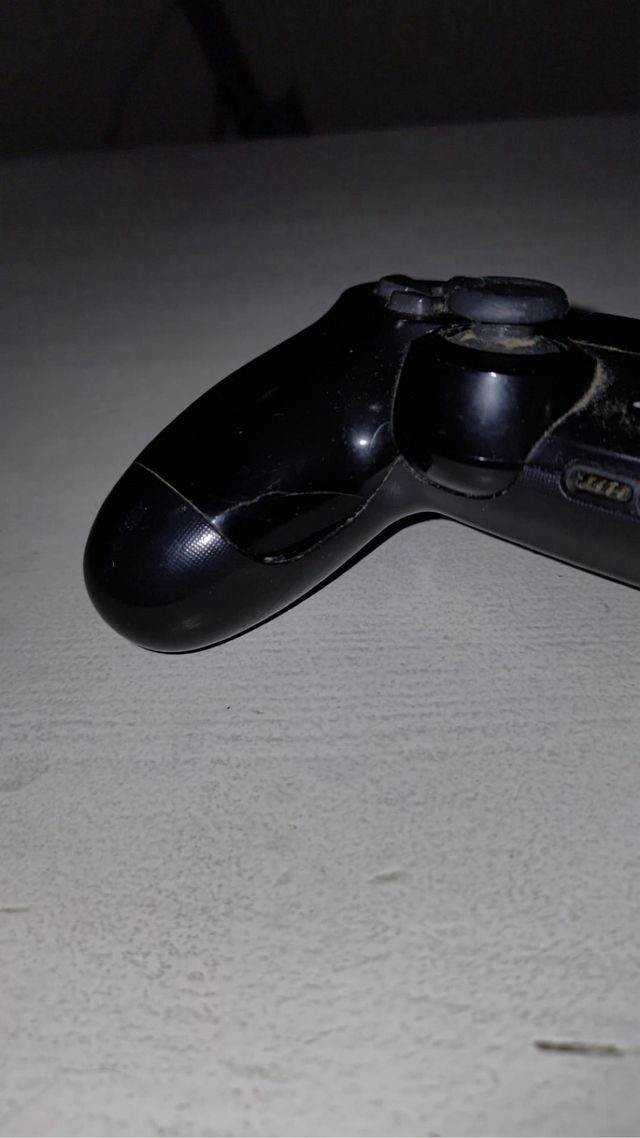 Mando PS4 Original Sony Negro que está roto
