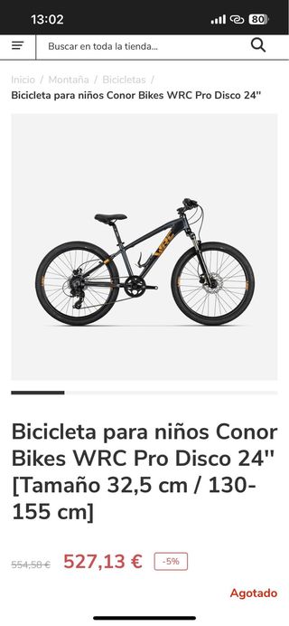 Bicicleta de montaña negra y rosa
