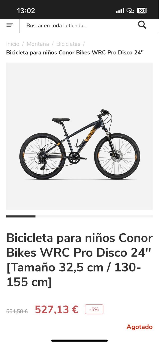 Bicicleta de montaña negra y rosa
